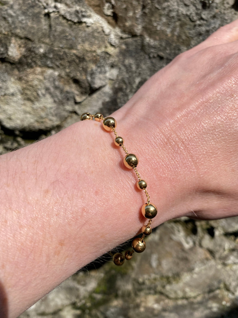 Beaded bracelet 7.5", 9ct yellow gold