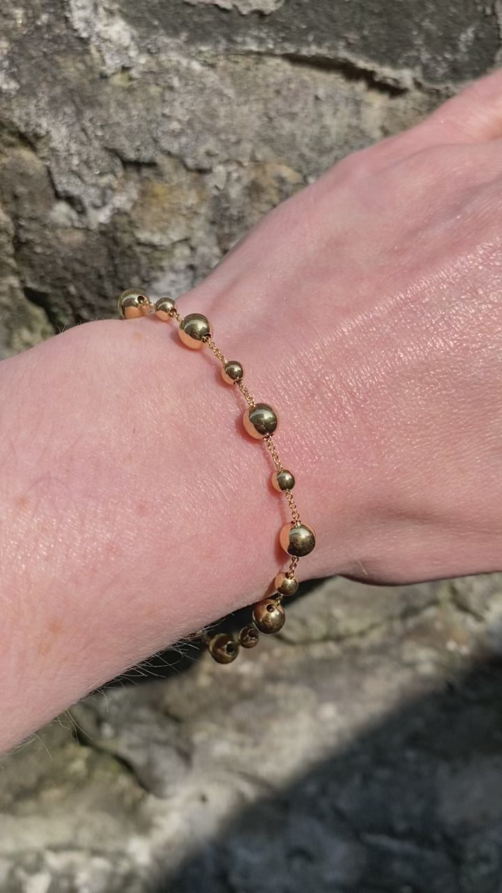 Beaded bracelet 7.5", 9ct yellow gold